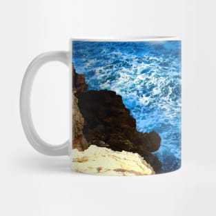 View from a high rocky coast of Polignano a Mare at the wavy Adriatic sea Mug